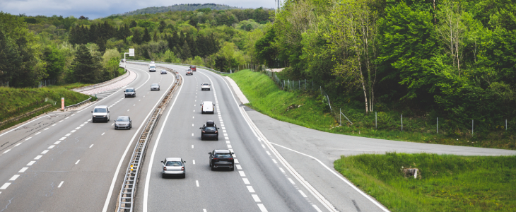 a highway with several cars