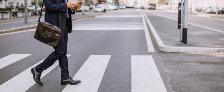 pedestrian crossing the street