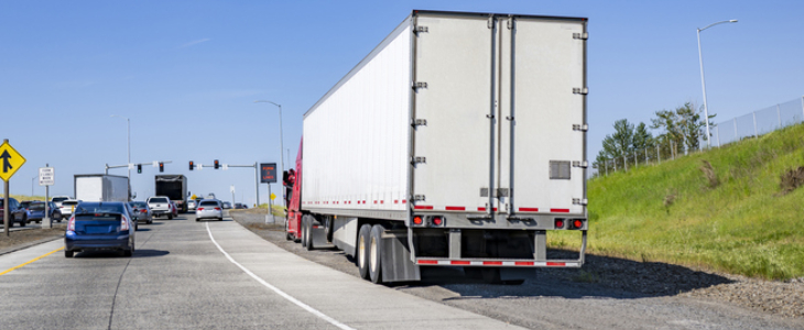 Commercial vehicle on the side of a road