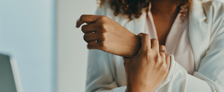 Woman holding her wrist after a personal injury accident