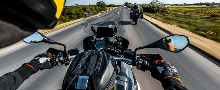 Motorcyclists riding on the road