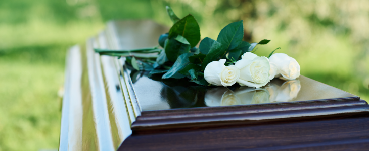 Casket with a rose to represent wrongful death