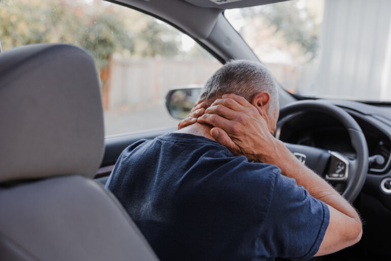 Middle-aged man with neck pain after a car accident