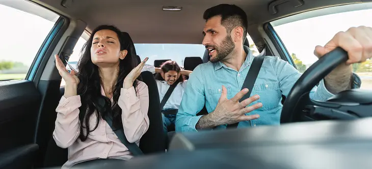 family-having-quarrel-car-husband-shouting-wife-while-driving-auto-child-sitting-back-seat